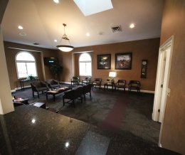 Inside, waiting room at {PRACTICE_NAME}